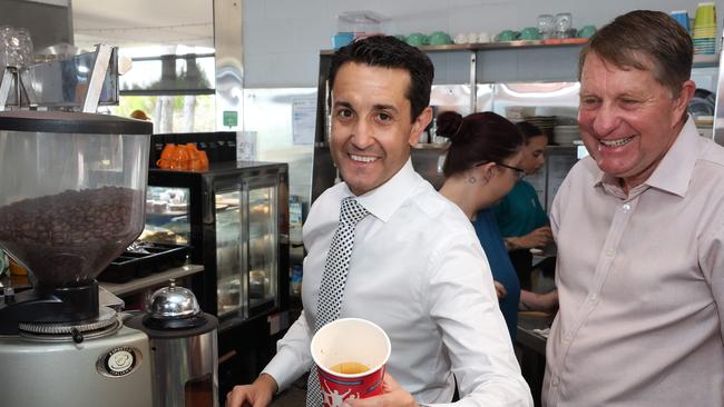 Leader of the Opposition David Crisafulli shows off his coffee making abilities with David Lee LNP candidate for Hervey Bay, during a visit to Aqua Vue cafe, Hervey Bay. Picture: Liam Kidston