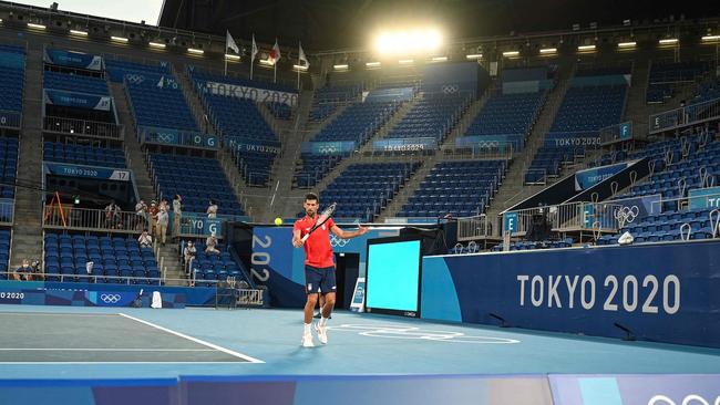 Novak Djokovic attends an empty training session at the Ariake Tennis Park. Picture: AFP