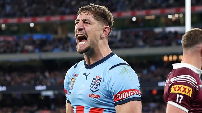 MELBOURNE, AUSTRALIA - JUNE 26:  Zac Lomax of the Blues celebrates after scoring a try during game two of the men's State of Origin series between New South Wales Blues and Queensland Maroons at the Melbourne Cricket Ground on June 26, 2024 in Melbourne, Australia. (Photo by Cameron Spencer/Getty Images)