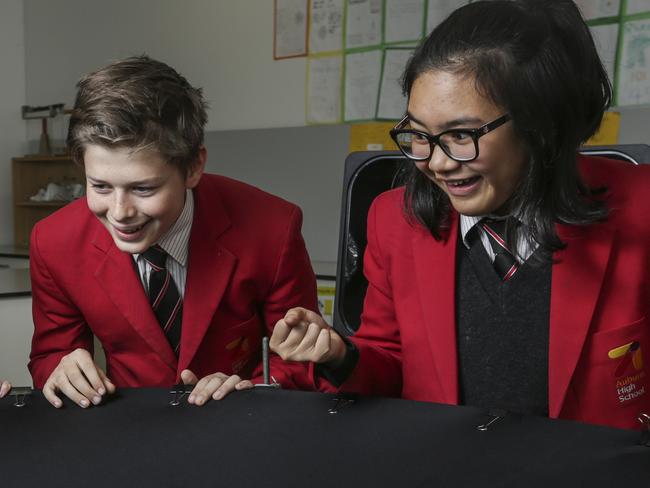 Einstein-First project being piloted across Aus - Auburn High students Amy 14, Tom 13 and Isshy 13 with a science activity.Picture by Wayne Taylor 26th July 2018.