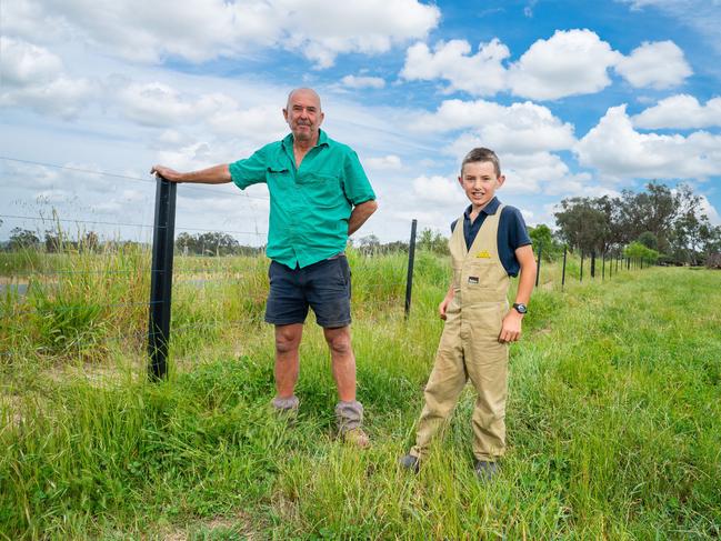 Plastic Forests makes fence posts from recycled soft plastics and helped several farmers rebuild after the Black Fire summers. The company supplies the PLUS posts to agriculture and equine properties around Australia and is currently testing a new oyster post in Queensland. Jindera farmer Harry Chisholm is pictured on his PLUS Post fence line with young neighbour Andy McLindon. Picture: Simon Dallinger