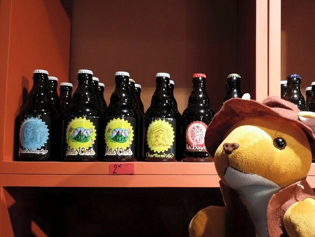 Rooporter sampling the local French beer. Picture: Peluche Travel/Facebook