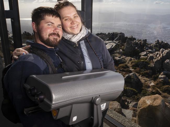 Adrian and Ally Della Franca of Perth, Western Australia at the Pinnacle lookout kunanyi/ Mount Wellington. Picture: Chris Kidd