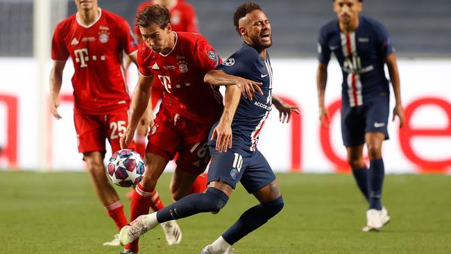 Neymar, right, fights for the ball with Bayern Munich's German midfielder Leon Goretzka. Picture: AFP