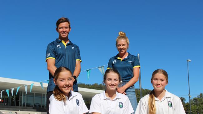 Triathletes Kye Wylde and Jaz Hedgeland (back) celebrate Somerset College being recognised as a training venue of the Triathlon Australia Gold Coast Performance Centre with students Malorie Gell, Holy Munro, Erin Shepherd (front). Pic: Supplied.