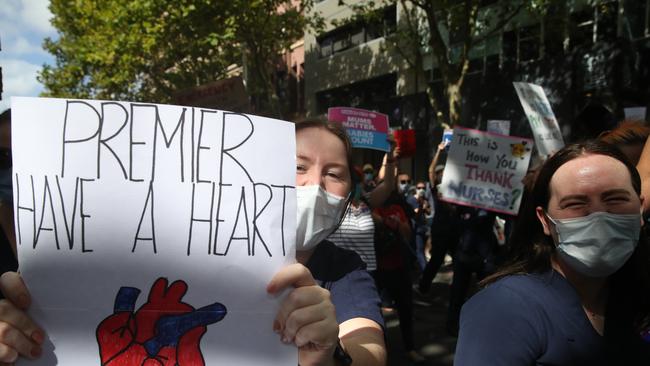 Nurses from across Sydney gathered in front of NSW Parliament today to protest staff shortages and wages. Pictured is Shelley a NICU Nurse. Picture: NCA NewsWire / David Swift