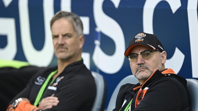 TOWNSVILLE, AUSTRALIA - JULY 01: West Tigers Board Director Lee Hagipantelis and CEO Justin Pascoe look on before the start of the round 18 NRL match between North Queensland Cowboys and Wests Tigers at Qld Country Bank Stadium on July 01, 2023 in Townsville, Australia. (Photo by Ian Hitchcock/Getty Images)