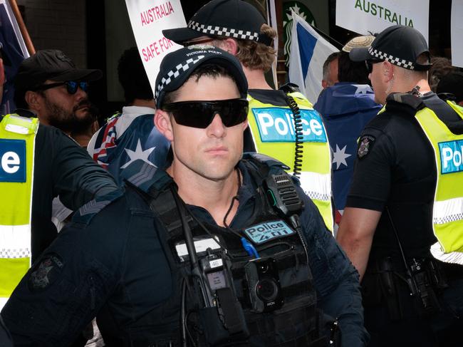 MELBOURNE, VICTORIA - February 2, 2025: Victorian Police officers separatea pro Israel group during a Pro-Palestine rally in MelbournePicture: NewsWire / Nadir Kinani