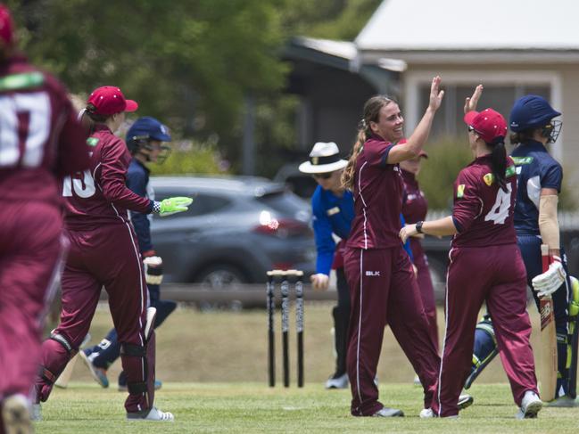 Queensland bowler Eliza Flynn celebrates the wicket of Victoria's Jordan Watson in Australian Country Cricket Championships women's division round one cricket at Harristown Park, Sunday, January 5, 2020. Picture: Kevin Farmer