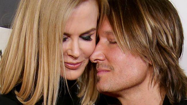 LOS ANGELES, CA - FEBRUARY 08: Nicole Kidman and Keith Urban (R) attend The 57th Annual GRAMMY Awards at the STAPLES Center on February 8, 2015 in Los Angeles, California. (Photo by Dan MacMedan/WireImage)