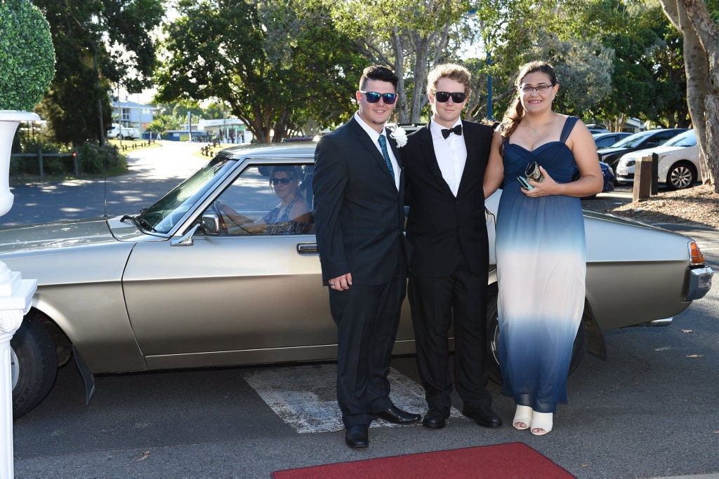 Hervey Bay High formal at the Waterfront - (L) Jacob Mallett, Jack McKeown and Terri Richards. Picture: Alistair Brightman