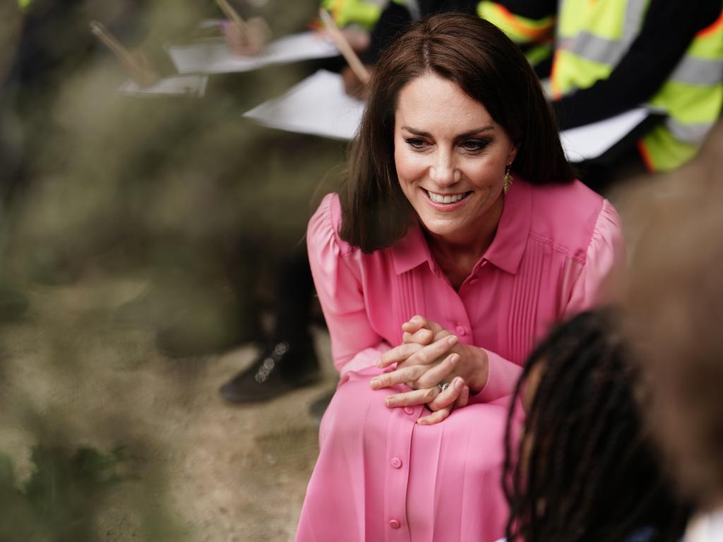 The future queen sits down with a group of kids, marking the first time in the event’s 110-year history that a Children's Picnic has taken place. Picture: Getty Images