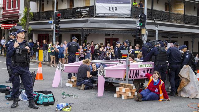 Extinction Rebellion activists in Brisbane’s CBD this month. Picture: AAP