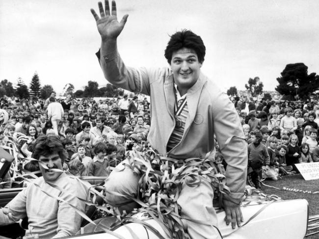 Gold medallist Lukin waving to crowd during a homecoming parade in Port Lincoln.