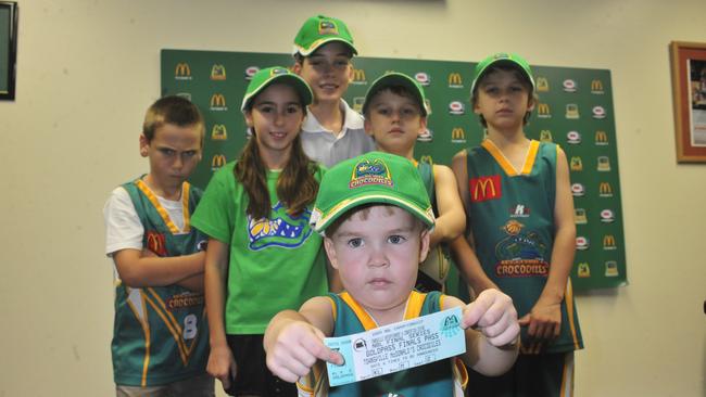 Cody Evans holds the first Townsville Crocodiles basketball semi final ticket with other Crocs fans Will Hempsall, Georgia Hempsall, Connor Evans, Thomas Evans and Rebecca Evans.