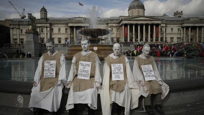 Extinction Rebellion climate change protesters demonstrate during a rally in Trafalgar Square, London. Picture: AP