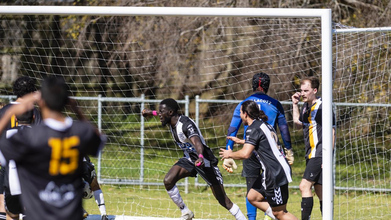 Elsadig Mohamed (centre) celebrates his goal for Willowburn against West Wanderers in U23 men FQ Darling Downs Presidents Cup football at West Wanderers, Sunday, July 24, 2022. Picture: Kevin Farmer