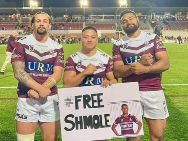 Manly's Josh Aloiai, Gordon Chan Kum Tong and Toafofoa Sipley with a message for Corey Parker. Pic: Instagram