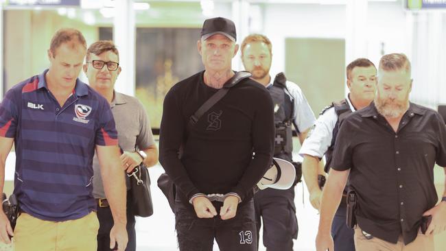 Nick ‘The Knife’ Forbes is arrested at Darwin airport. Picture: Glenn Campbell