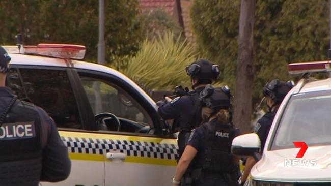 Police surround an Elizabeth Vale address after reports of gunfire. Picture: 7 News.