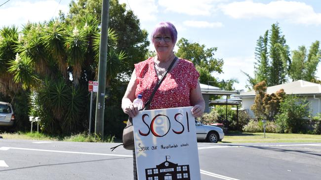 A community member stands at a press conference outside Murwillumbah East Public School on November 20 to protest the new Murwillumbah mega school. Photo: Jessica Lamb