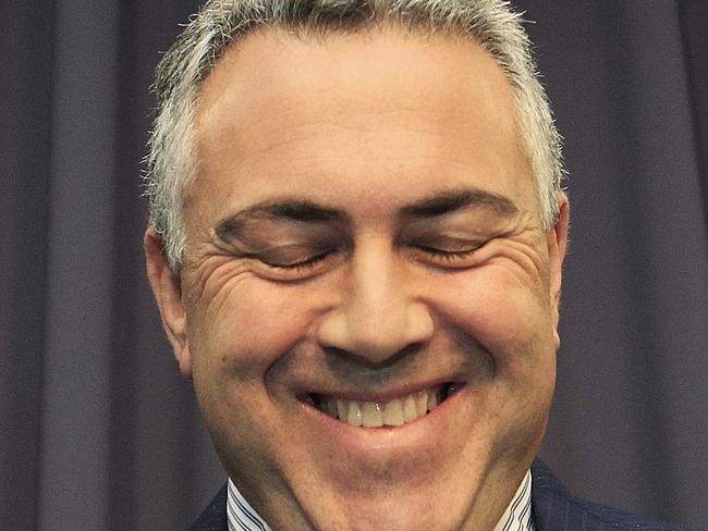 Treasurer Joe Hockey during a press conference at Parliament House in Canberra, Wednesday, Dec. 4, 2013. (AAP Image/Daniel Munoz) NO ARCHIVING