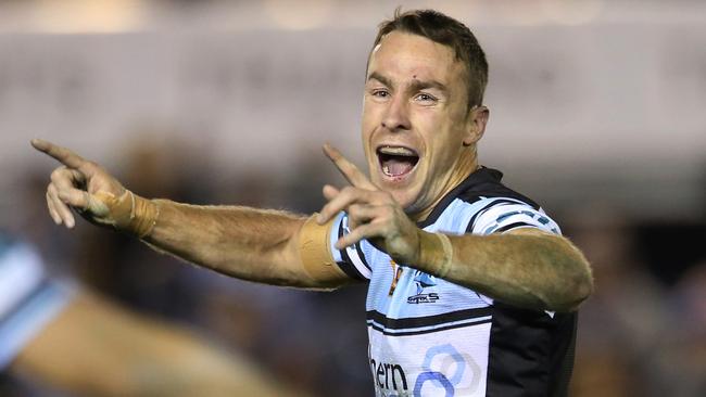 James Maloney celebrates after kicking the winning field goal against the Warriors.