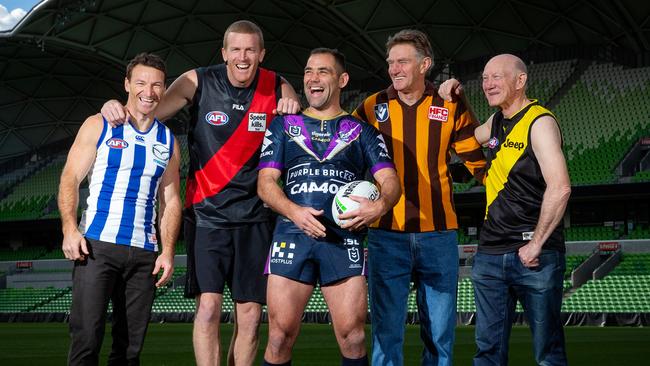 Melbourne Storm skipper Cameron Smith was joined by members of the AFL’s 400-game club Brent Harvey, Dustin Fletcher, Michael Tuck and Kevin Bartlett ahead of his 400th NRL game this weekend. Picture: Mark Stewart