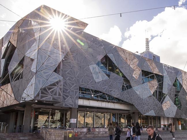 A view of Federation Square, which has been nominated to the National Trust of Australia's Victorian register, in Melbourne, Wednesday, August 1, 2018. The National Trust of Australia's Victorian division on Tuesday nominated the CBD landmark for the Victorian Heritage Register to recognise its "historical, architectural, aesthetic and social significance to the state". (AAP Image/Daniel Pockett) NO ARCHIVING