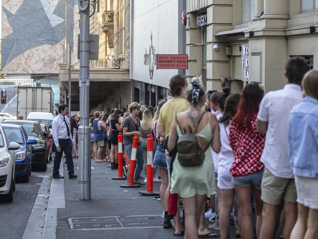 Big queues up Russell Street and down Flinders Lane Melbourne for the Halsey concert. Picture: Sarah Matray