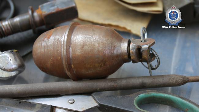 A rusty old grenade was also found as part of the raids. Picture: NSW Police