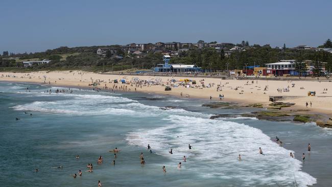 People hit Coogee Beach as a heatwave causes temperatures to soar across southeast Australia. Picture: NewsWire / Monique Harmer