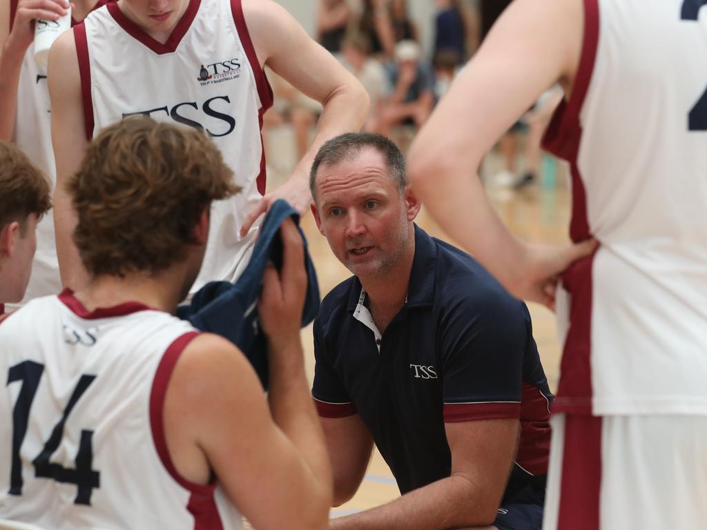 Basketball Australia Schools Championships at Carrara. Mens open final, Lake Ginninderra College Lakers V TSS (in white). Tss's coach talks to his players in the final. Picture Glenn Hampson