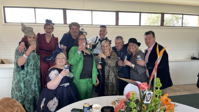 Hamilton Cup Races 2022 - Joss Brooks and his friends raise a toast.