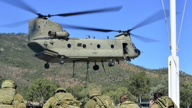 An M777 Howitzer from 4th Regiment, Royal Australian Artillery,was lifted by a CH-47 Chinook helicopter from 5th Aviation Regiment in an air mobile operations training activity at Lavarack Barracks. PICTURE: MATT TAYLOR.