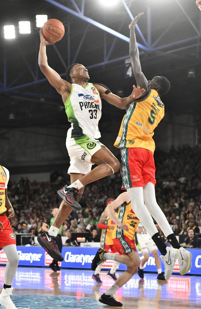 Malique Lewis gets up for the Phoenix during their win against the JackJumpers. Picture: Getty Images