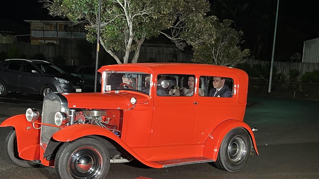 The students arrive at St Mary's College formal at the Brolga Theatre.