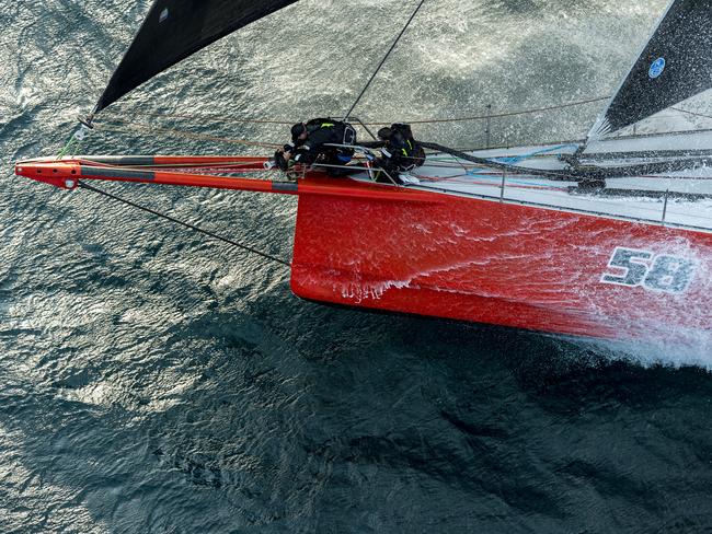 Comanche on Day 2 of Sydney to Hobart. Sail No: AUS12358, Bow No: 58, Owner: Jim Cooney, Skipper: Jim Cooney, Design: Vplp, Club: CYCA. Picture: ROLEX/KURT ARRIGO