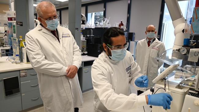 Scott Morrison, left, at the AstraZeneca laboratories in Macquarie Park, Sydney, on Wednesday. Picture: Getty Images