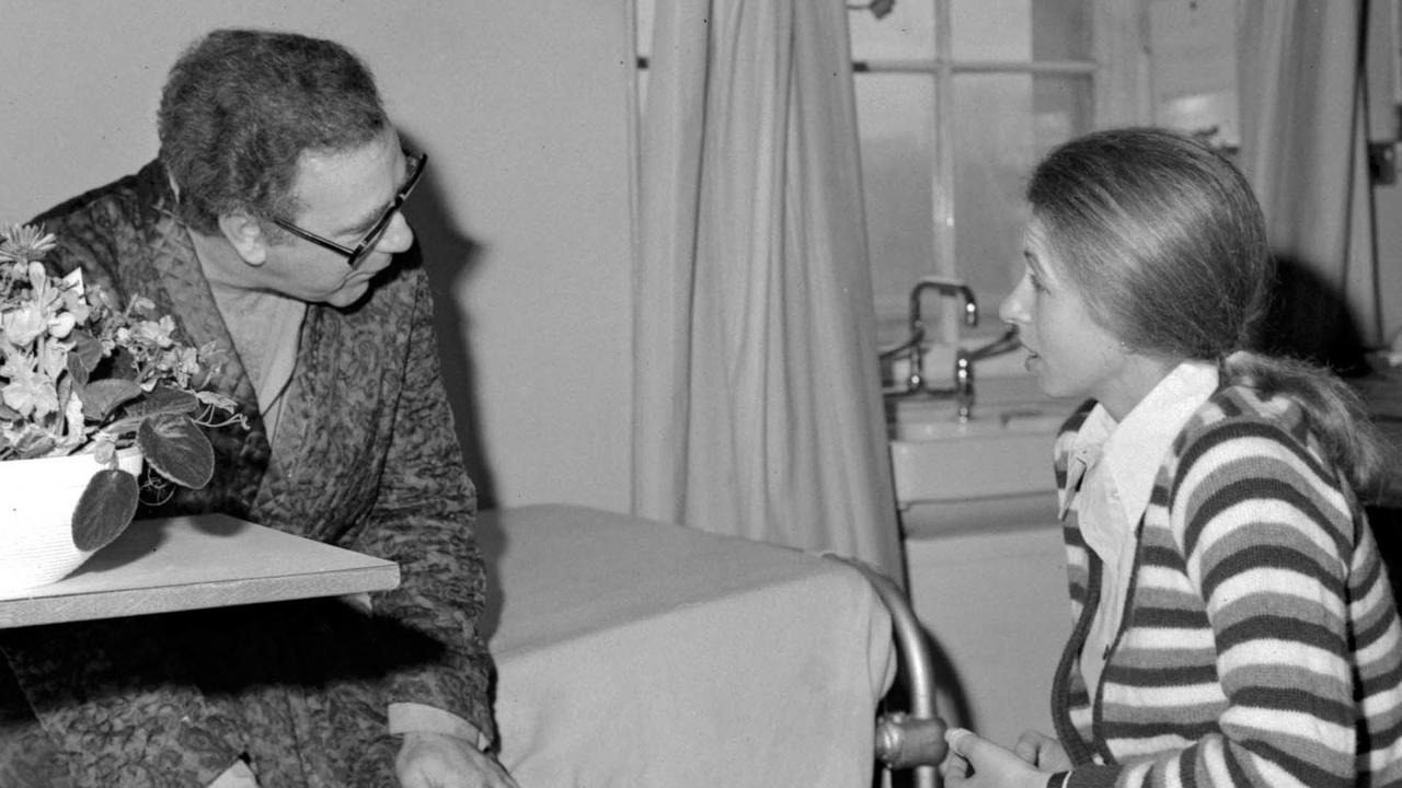 Princess Anne talks with Brian McConnell in London's St. George's Hospital, after he was shot during the kidnap attempt. Picture: AP