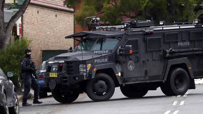 Armed tactical police at the crime scene. Picture: Sam Ruttyn