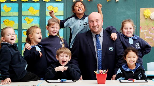 Blue Haven Public School Principal Paul McDermott with Kindergarten students when news broke out they were finalists for Australian School of the Year. Picture: Sue Graham