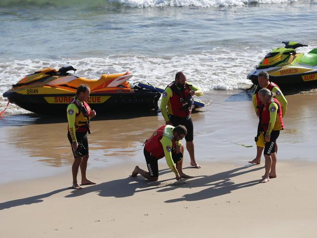 Surf Life Saving jet skis were out early this morning as part of the search. Picture: David Swift