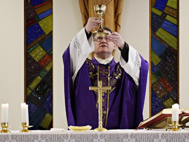 Fr Sam Lynch, priest at St Patrick's Summer Hill, during 8am mass on the 29th of November. Lynch will cancel Christmas mass this year amid COVID restrictions because he doesn't want to turn away people from church because of its small capacity under the 4sqm rule. Picture: Adam Yip