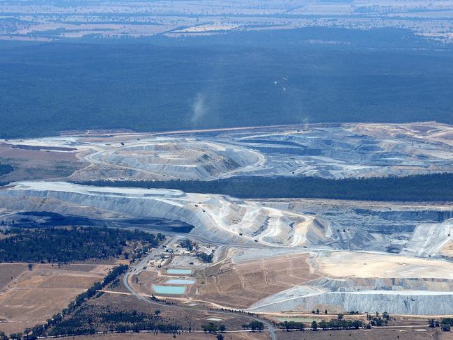 What an open-cut mine looks like from the air: The Boggabri Coal and Whitehaven mines on the edge of Leard State Forest. Picture by Peter Lorimer