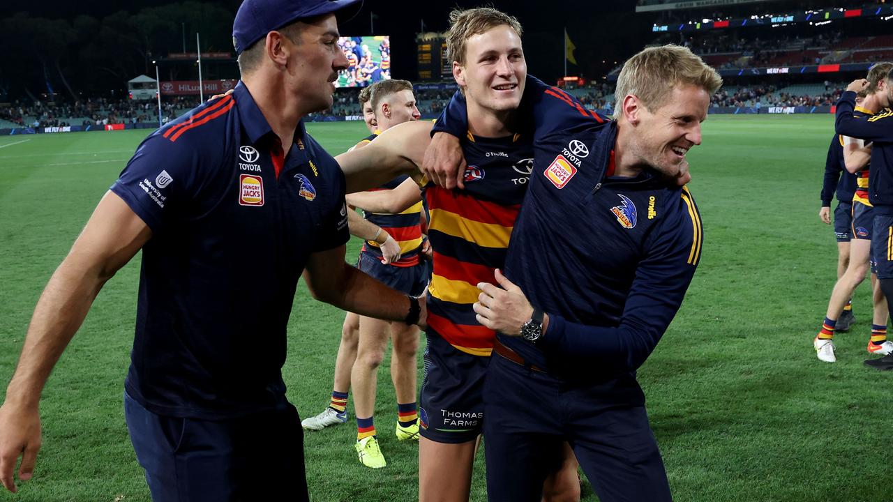 Walker celebrating with Jordan Dawson and Rory Sloane after last week’s Showdown. Picture: AFL Photos via Getty Images