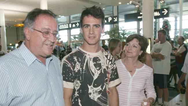 Stephen Carroll arriving back in Australia, pictured with his dad Brian and mum Michelle. Picture: Richard Webb