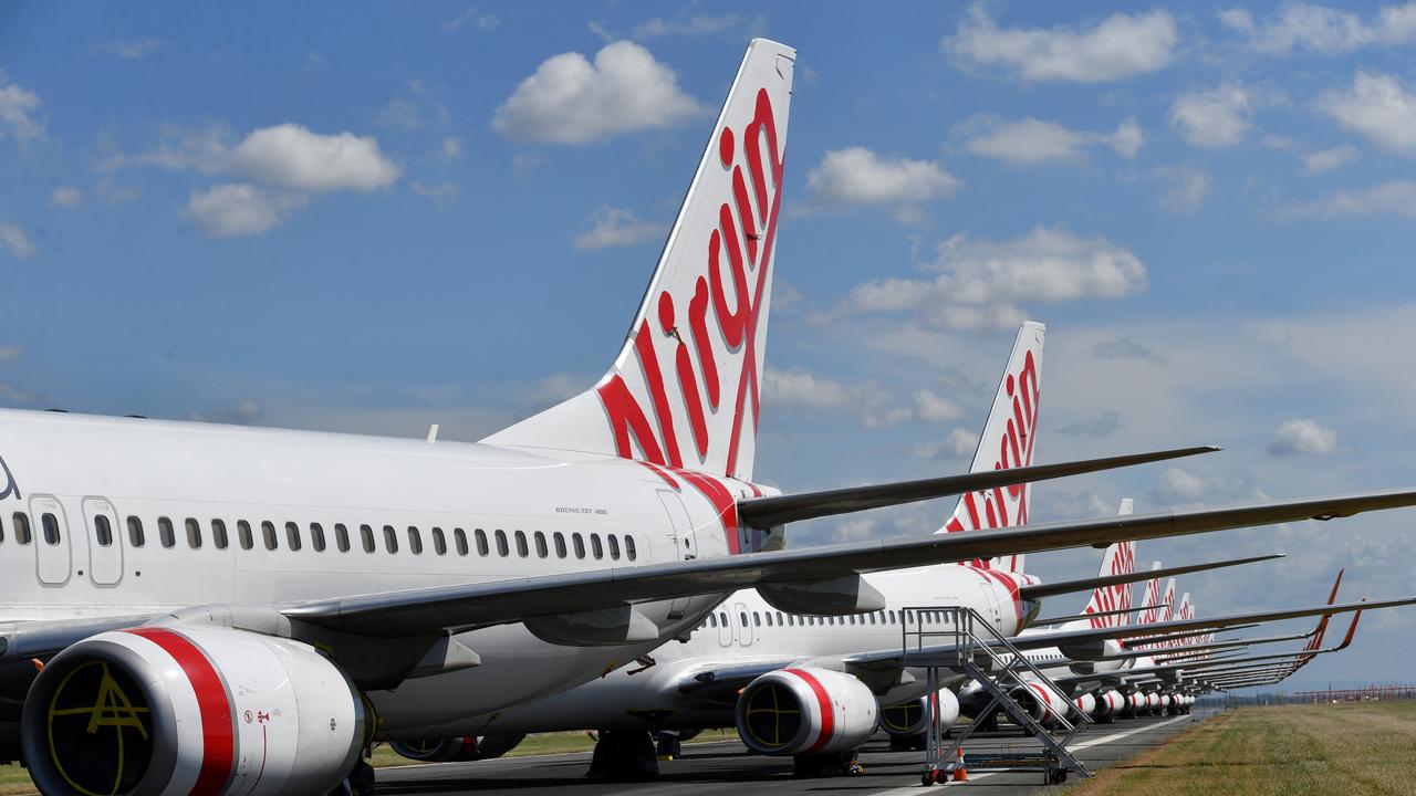 Grounded Virgin aircraft parked at Brisbane Airport. Picture: Darren England/AAP