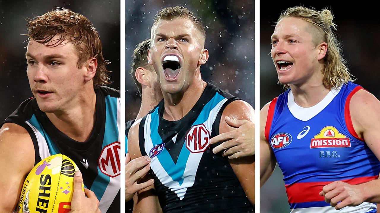 Port Adelaide willed themselves to victory over the Western Bulldogs in the wet.