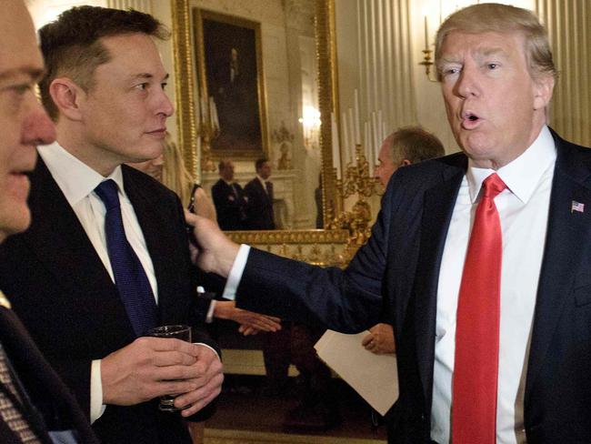 Donald Trump greets Elon Musk before a policy and strategy forum with executives in 2017 in Washington, DC. Picture: AFP